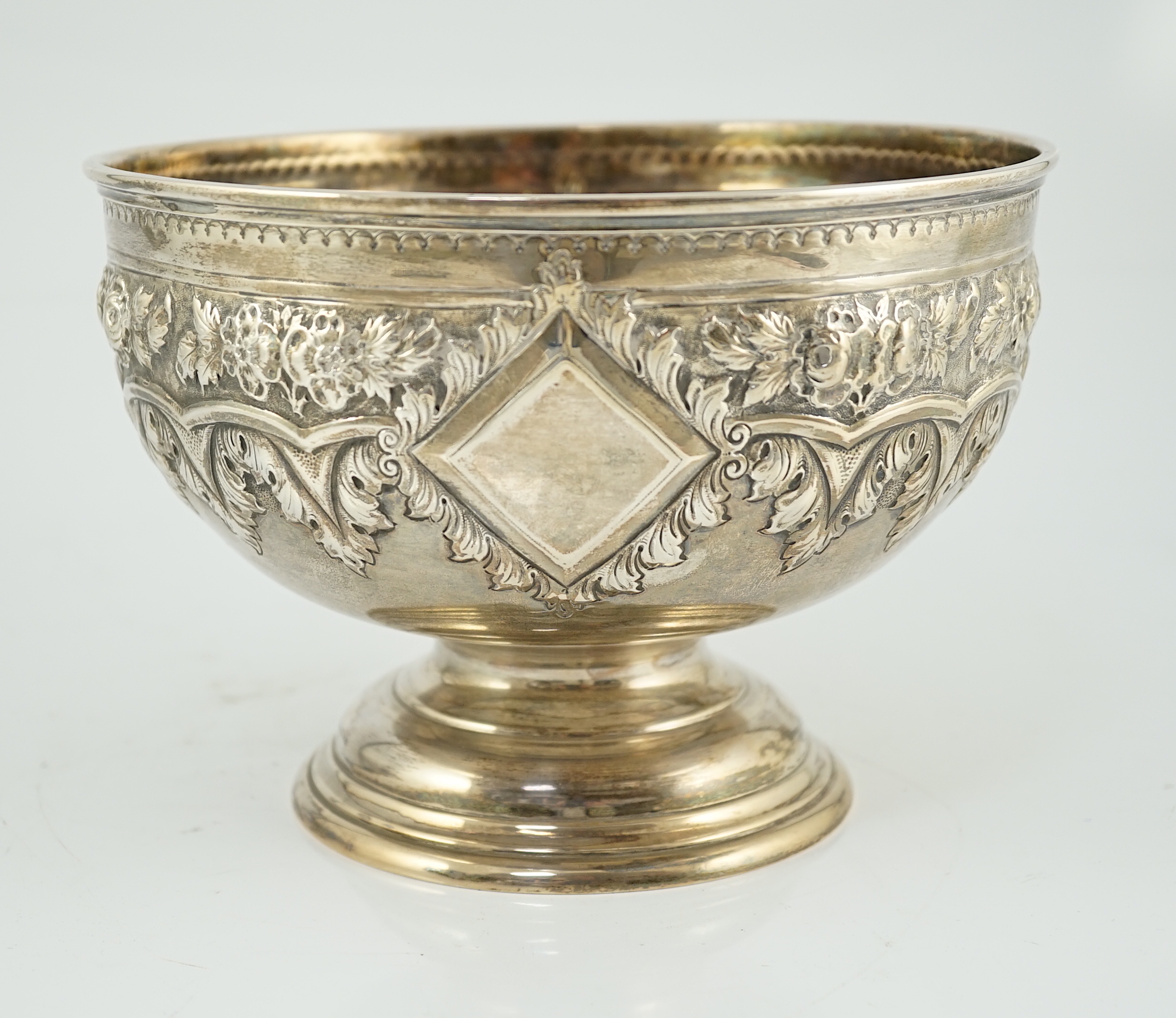 An Edwardian embossed silver rose bowl, by Walker & Hall